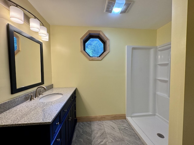24 N Tiery St, Old Town, ME 04468 - bathroom with vanity and a shower