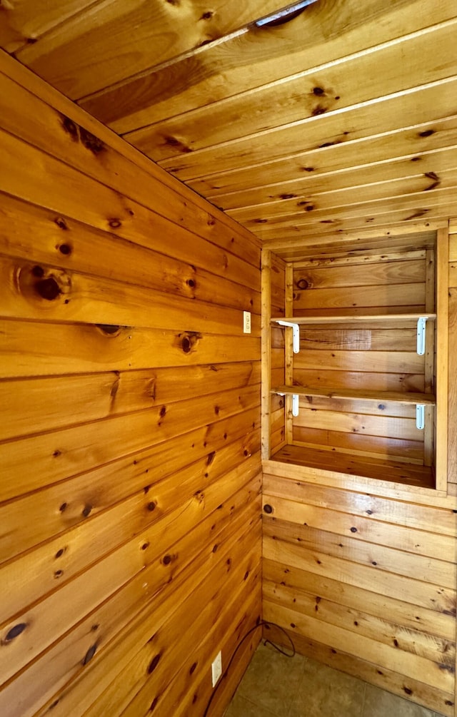 24 N Tiery St, Old Town, ME 04468 - unfurnished room with a relaxing sauna, wood walls, wood ceiling, and tile patterned flooring