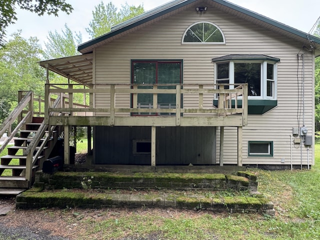24 N Tiery St, Old Town, ME 04468 - rear view of house with stairway and a deck