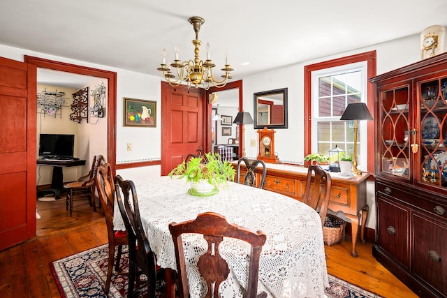 5 Chestnut St, Vinalhaven, ME 04863 - dining space with a chandelier and hardwood / wood-style flooring
