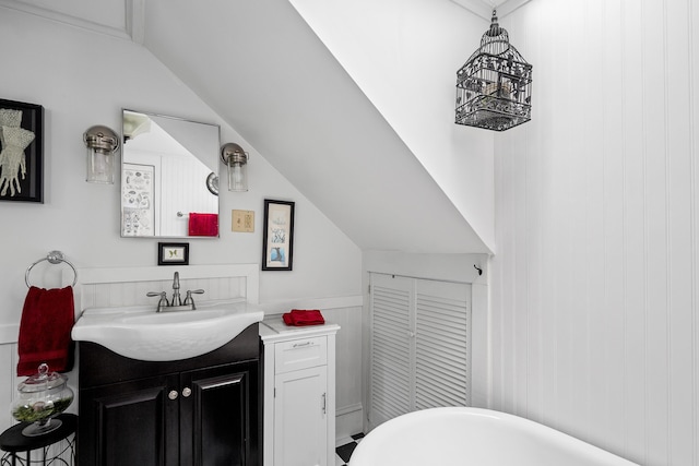 5 Chestnut St, Vinalhaven, ME 04863 - full bath featuring vanity, a freestanding bath, and vaulted ceiling