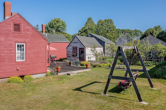 5 Chestnut St, Vinalhaven, ME 04863 - view of jungle gym with a deck, a yard, and an outdoor structure