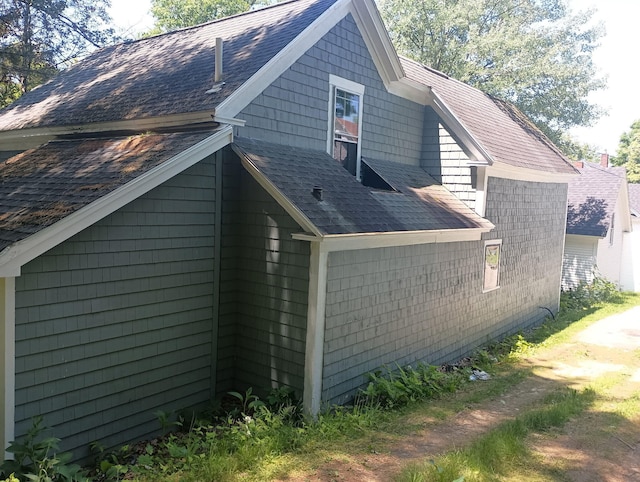 44 Baldwin St, Livermore Falls, ME 04254 - view of property exterior featuring a shingled roof