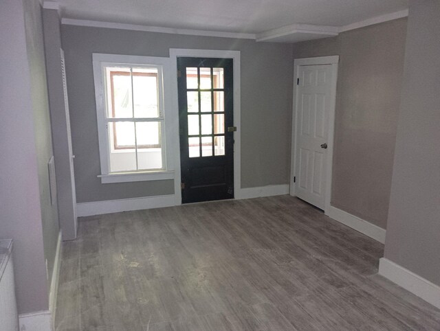44 Baldwin St, Livermore Falls, ME 04254 - entryway featuring crown molding and wood finished floors