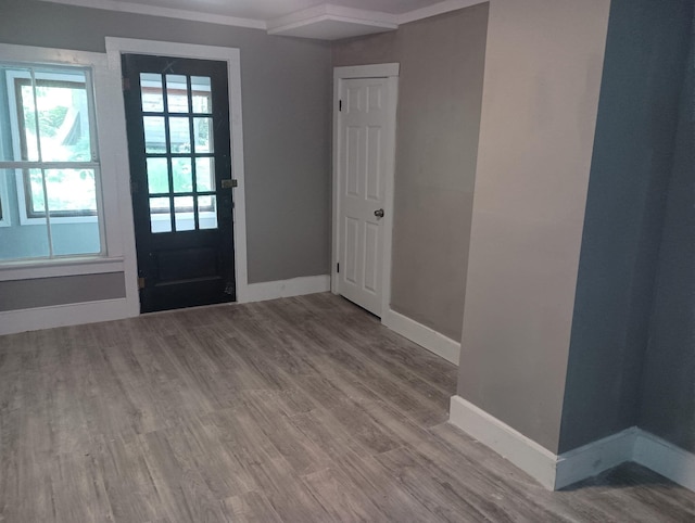 44 Baldwin St, Livermore Falls, ME 04254 - foyer entrance with baseboards and wood finished floors