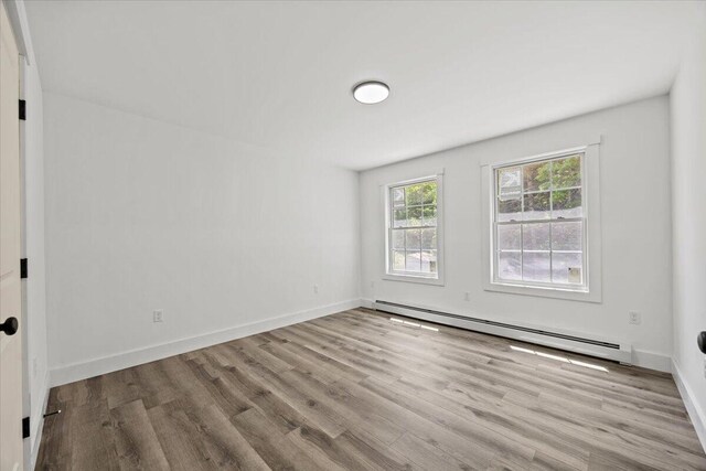 34 Oak Woods Dr, Hiram, ME 04041 - spare room with a baseboard radiator and wood finished floors