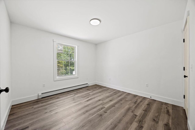 34 Oak Woods Dr, Hiram, ME 04041 - spare room with a baseboard radiator and wood finished floors