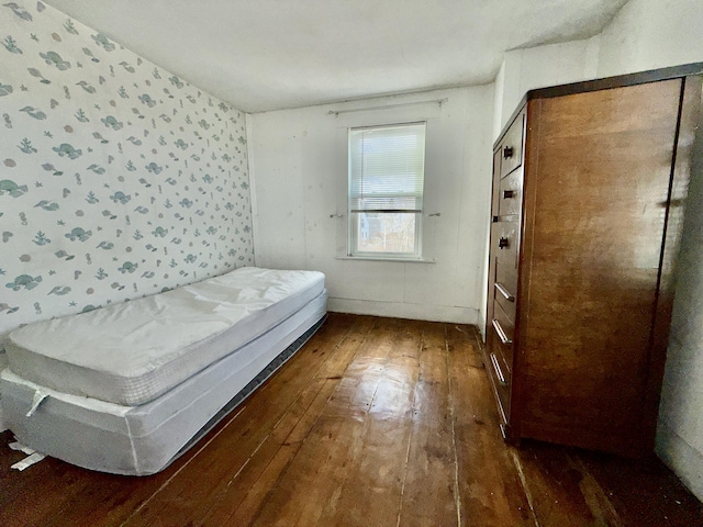 297 Long Beach Ave, York, ME 03909 - bedroom with hardwood / wood-style floors and wallpapered walls