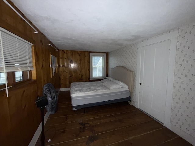 297 Long Beach Ave, York, ME 03909 - bedroom featuring wallpapered walls and wood-type flooring