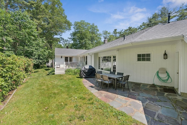 53 Beach Ave, Kennebunk, ME 04043 - view of green lawn with a patio and a wooden deck