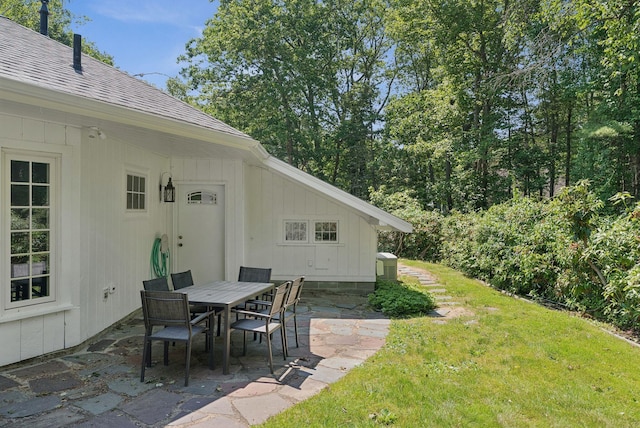 53 Beach Ave, Kennebunk, ME 04043 - view of grassy yard featuring a patio area and outdoor dining area