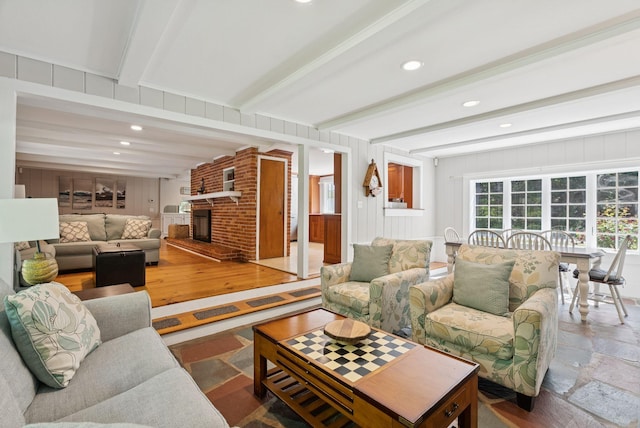 53 Beach Ave, Kennebunk, ME 04043 - living area with beamed ceiling, a fireplace, and recessed lighting