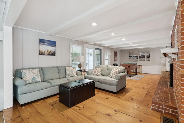 53 Beach Ave, Kennebunk, ME 04043 - living room with billiards table, light wood-type flooring, beam ceiling, recessed lighting, and a decorative wall