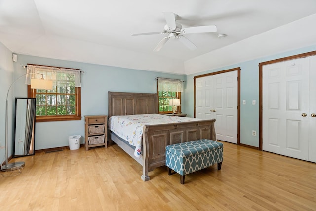 53 Beach Ave, Kennebunk, ME 04043 - bedroom featuring multiple closets, light wood-style flooring, and multiple windows