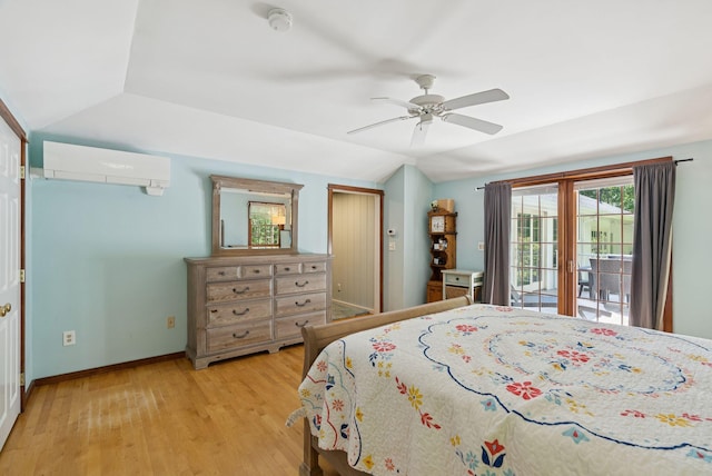 53 Beach Ave, Kennebunk, ME 04043 - bedroom with an AC wall unit, vaulted ceiling, light wood-style floors, access to outside, and ceiling fan