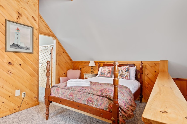 11 Overlook Rd, Rangeley, ME 04970 - bedroom with carpet, wood walls, and lofted ceiling