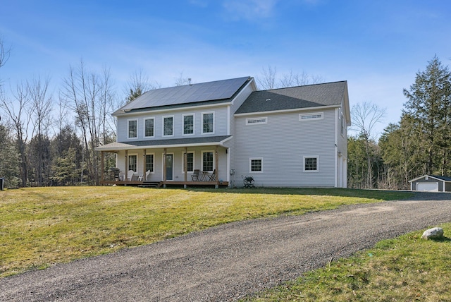 5 Harmony Way, Falmouth, ME 04105 - view of front of property with covered porch, solar panels, and a front yard