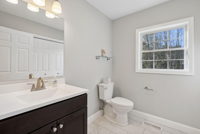 5 Harmony Way, Falmouth, ME 04105 - bathroom featuring vanity and marble look tiles