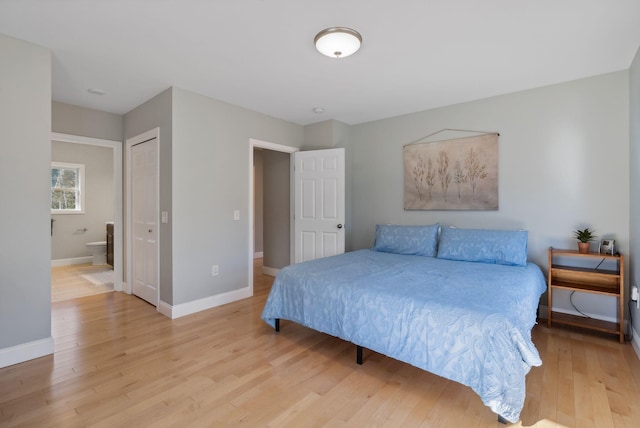 5 Harmony Way, Falmouth, ME 04105 - bedroom with light wood-style flooring and connected bathroom