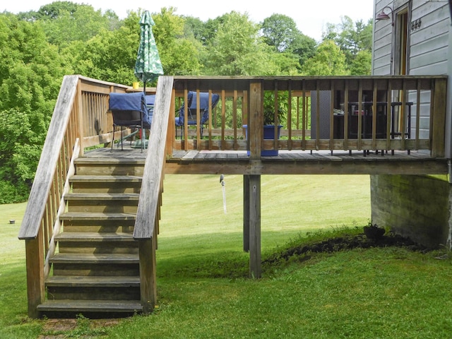 170 Main St, Sangerville, ME 04479 - view of playground featuring a wooden deck and a lawn