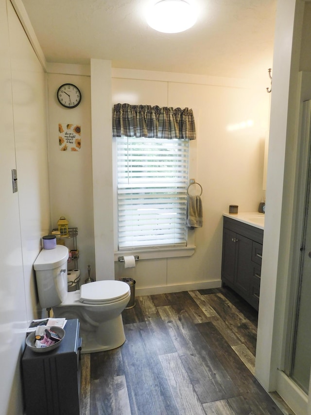 170 Main St, Sangerville, ME 04479 - bathroom featuring wood finished floors and vanity