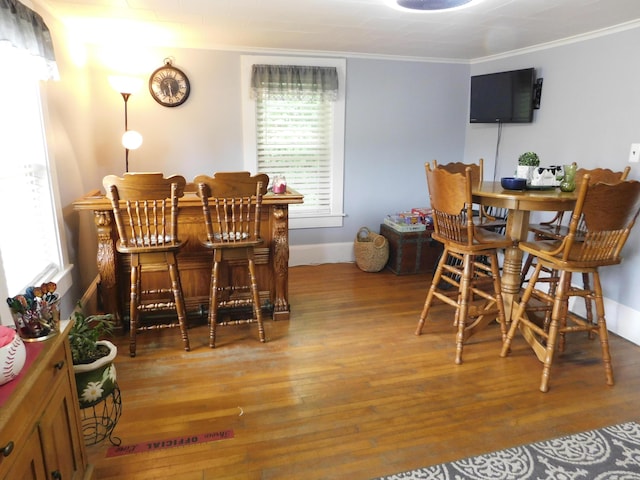 170 Main St, Sangerville, ME 04479 - dining room featuring ornamental molding, wood finished floors, and plenty of natural light