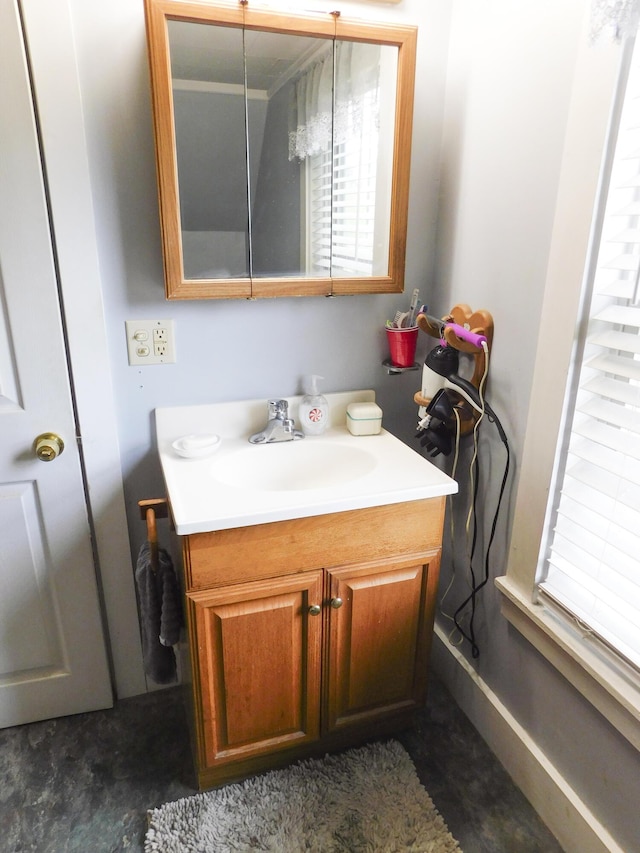 170 Main St, Sangerville, ME 04479 - bathroom featuring vanity and healthy amount of natural light
