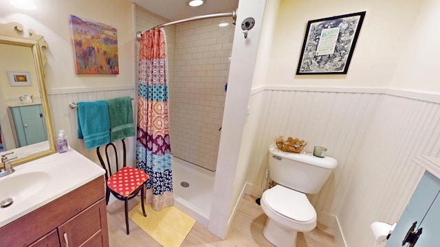 25 Church St, Lubec, ME 04652 - bathroom with vanity, wainscoting, and a tile shower