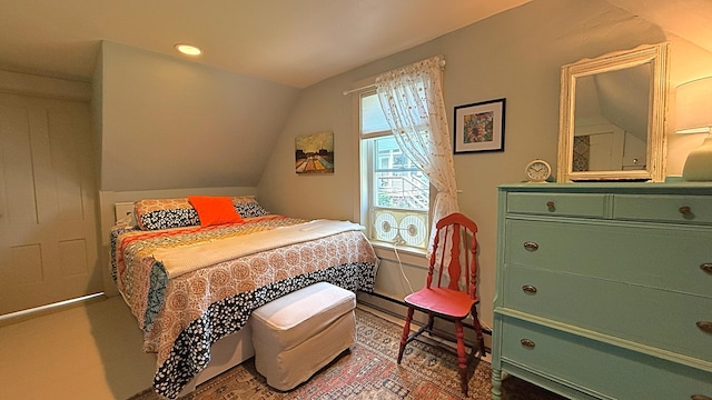 25 Church St, Lubec, ME 04652 - bedroom featuring vaulted ceiling and a baseboard heating unit