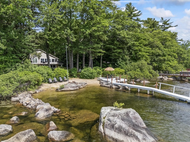 7 Papoose Island Rd, Raymond, ME 04071 - dock with a water view and a forest view