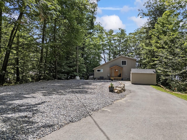 7 Papoose Island Rd, Raymond, ME 04071 - view of front facade featuring asphalt driveway