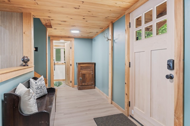 7 Papoose Island Rd, Raymond, ME 04071 - foyer with wooden ceiling and light wood-style flooring