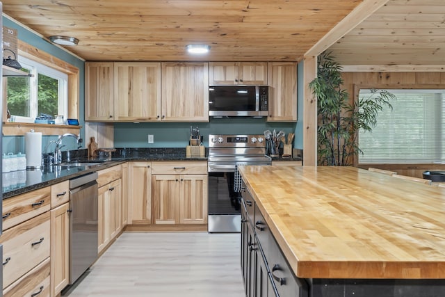 7 Papoose Island Rd, Raymond, ME 04071 - kitchen featuring appliances with stainless steel finishes, wood ceiling, butcher block countertops, light brown cabinetry, and light wood-style flooring