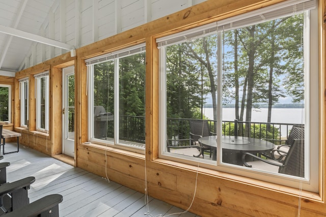 7 Papoose Island Rd, Raymond, ME 04071 - sunroom with hardwood / wood-style flooring, a water view, lofted ceiling, and wooden walls
