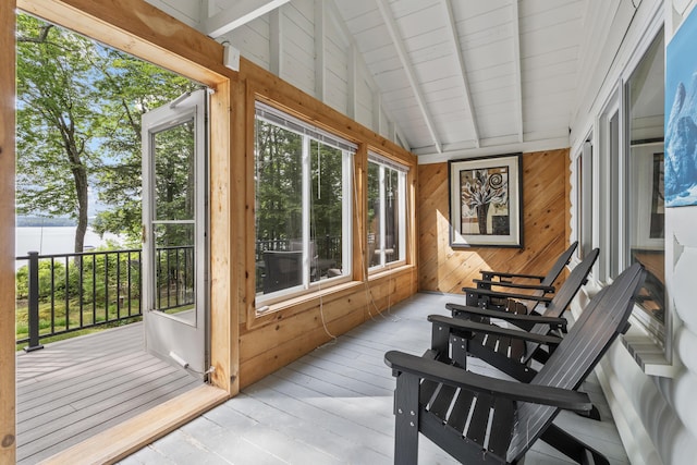 7 Papoose Island Rd, Raymond, ME 04071 - sunroom / solarium featuring wooden walls, plenty of natural light, and hardwood / wood-style flooring