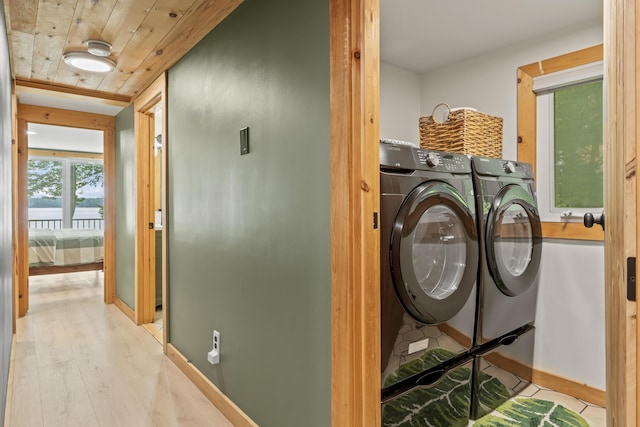 7 Papoose Island Rd, Raymond, ME 04071 - laundry area featuring washing machine and dryer and baseboards