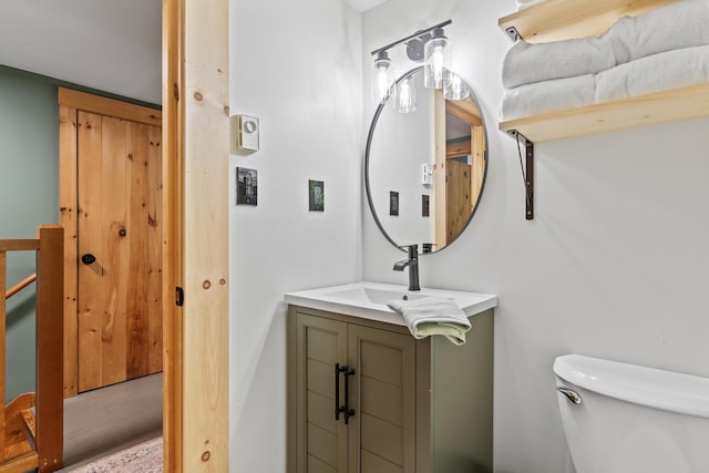 7 Papoose Island Rd, Raymond, ME 04071 - bathroom with toilet and vanity