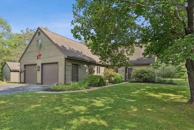 2 Far View Cir, Saco, ME 04072 - view of front facade with a shingled roof, a front yard, and a chimney