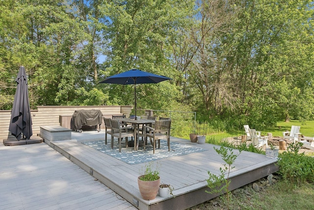 2 Far View Cir, Saco, ME 04072 - wooden deck featuring outdoor dining space, a grill, and view of wooded area