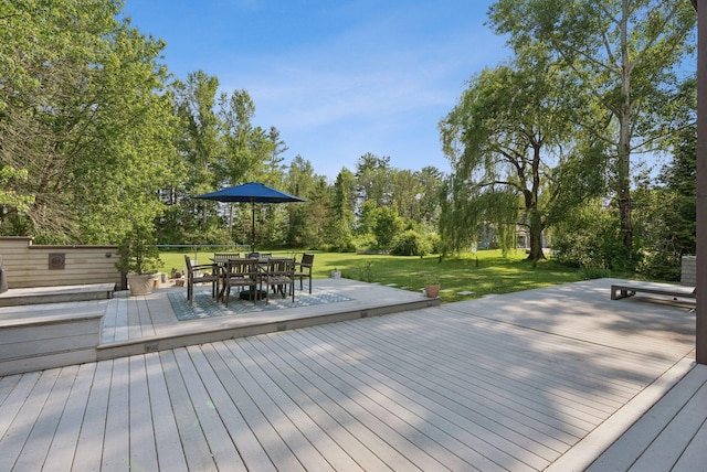 2 Far View Cir, Saco, ME 04072 - wooden terrace featuring a lawn, outdoor dining space, and view of wooded area