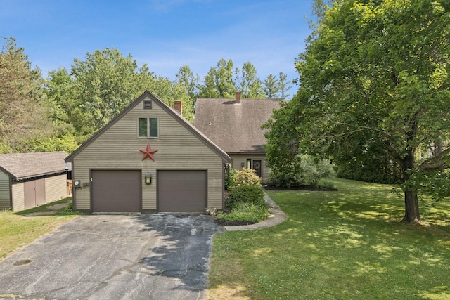 2 Far View Cir, Saco, ME 04072 - view of front facade featuring an outdoor structure, a front lawn, and a chimney
