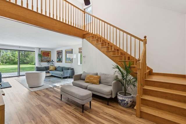 2 Far View Cir, Saco, ME 04072 - living room with wood finished floors, stairs, and a high ceiling