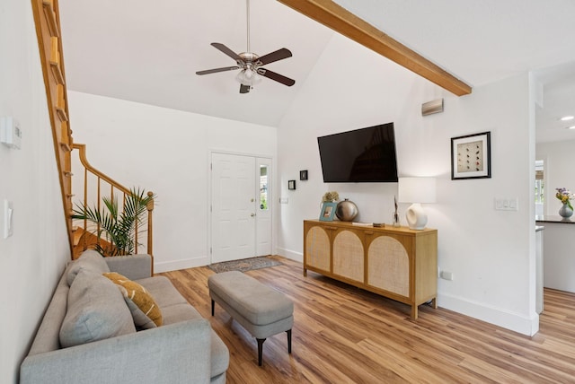 2 Far View Cir, Saco, ME 04072 - living area featuring wood finished floors, ceiling fan, high vaulted ceiling, stairs, and beamed ceiling