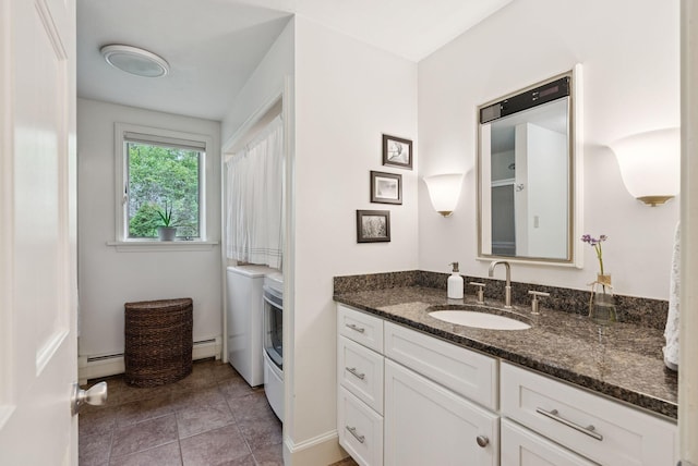 2 Far View Cir, Saco, ME 04072 - bathroom with a baseboard heating unit, vanity, and tile patterned flooring