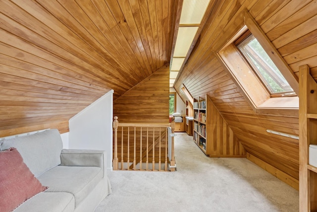 2 Far View Cir, Saco, ME 04072 - additional living space featuring wood ceiling, wooden walls, vaulted ceiling, carpet flooring, and a skylight