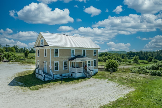 125 Pigeon Hill Rd, Mechanic Falls, ME 04256 - view of front of home featuring a porch and a metal roof