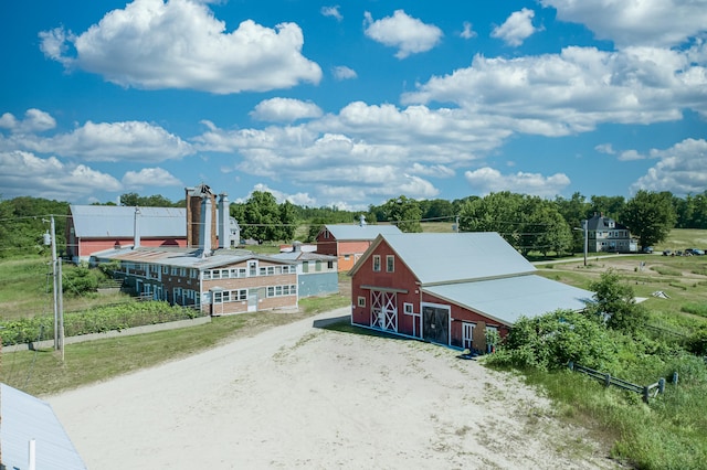 125 Pigeon Hill Rd, Mechanic Falls, ME 04256 - view of building exterior featuring a barn and driveway