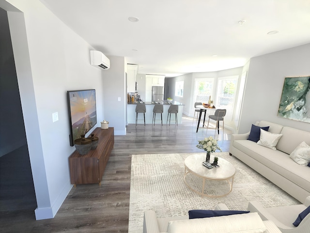 106 Cumberland Ave Unit 201, Portland, ME 04101 - living area with an AC wall unit, dark wood finished floors, and recessed lighting