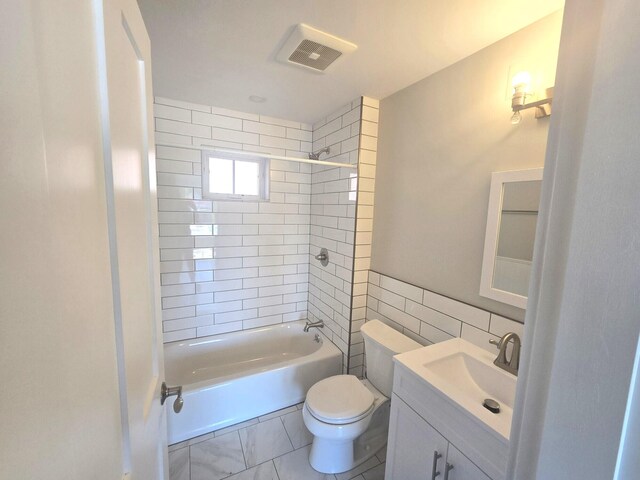 106 Cumberland Ave Unit 201, Portland, ME 04101 - bathroom featuring vanity, tile walls, and shower / bath combination