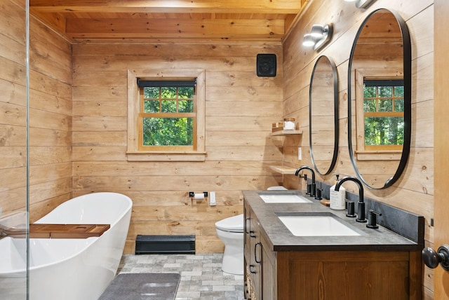 7 Coven Hill Ln, South Bristol, ME 04568 - full bath featuring wood ceiling, wood walls, double vanity, and a soaking tub